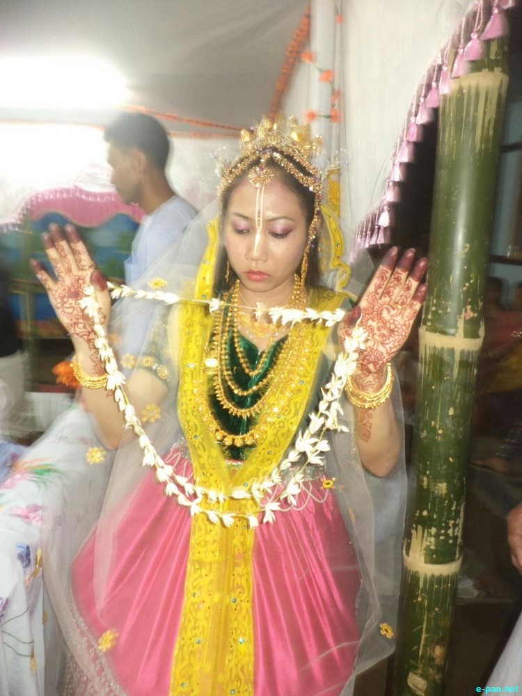 Assam Manipuri Marriage in traditional Meitei dress at Hojai Kalinagar Village, Nagoan District, Assam :: November 2013