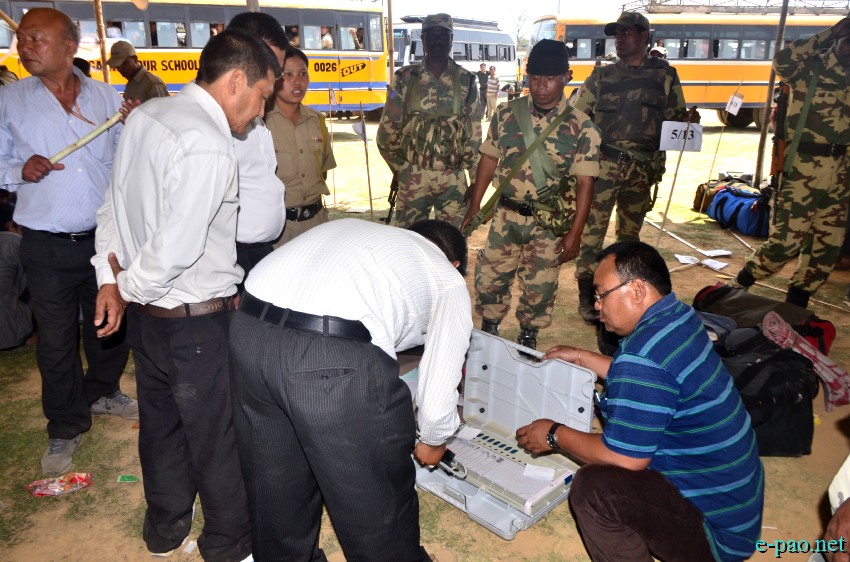  Polling Personnels checking the EVMs in preparation for  inner Manipur parliamentary Constituency  at Hatta Kangjeibung on 16  April 2014 