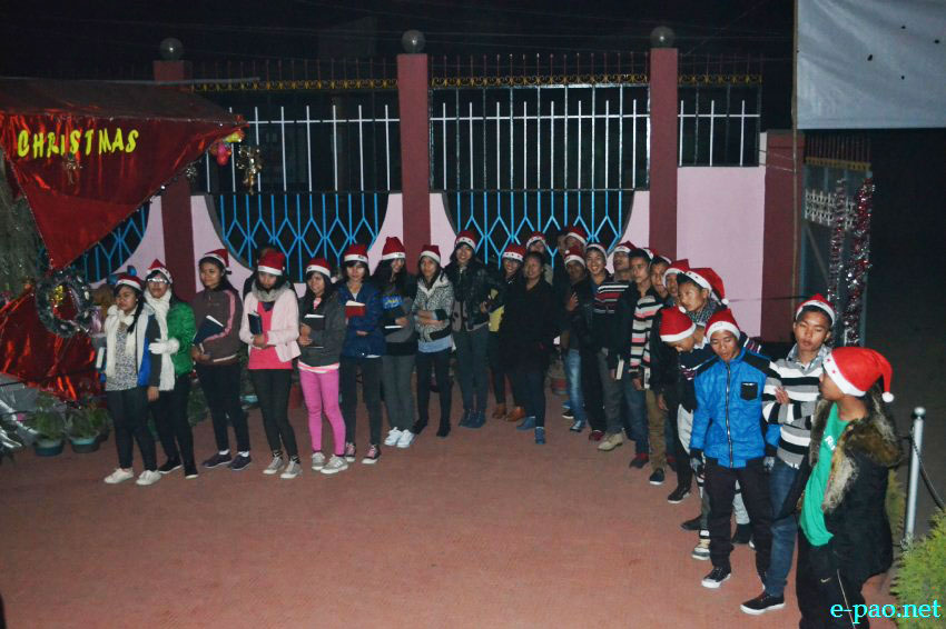 People praying at a Church at midnight and also placing a portrait of infant Jesus inside the hut as part of Christmas Eve celebrations at Imphal Manipur on December 24, 2013. 