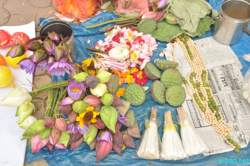 Women vendors selling items used during 'Kang Chingba'  Festival at Khwairamband Keithel, Imphal  :: June 29, 2014