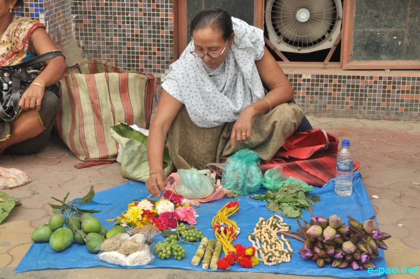 Women vendors selling items used during 'Kang Chingba'  Festival at Khwairamband Keithel, Imphal  :: June 29, 2014