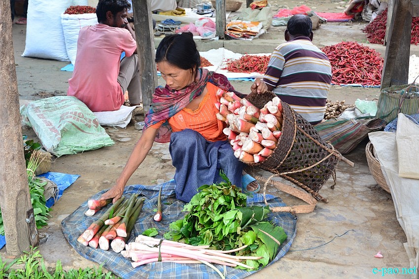 A woman vendor at the Jiribam Vegetable Market  :: 11 May 2015