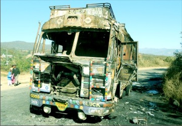 File pic of a truck torched at Senapati on Dec 26 night