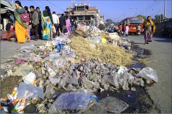 Rotting garbage piled up along BT Road tells the story