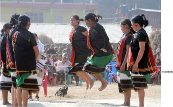 Women taking part in a traditional game during the festival