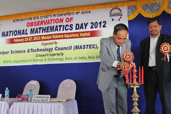 Ceremonial lamp being lit on the occasion of National Mathematics Day observance at Manipur Science Aquarium, DMC campus