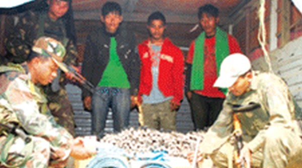Army troops with recovered explosives