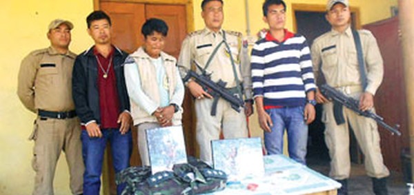 The three held persons along with the seized drugs