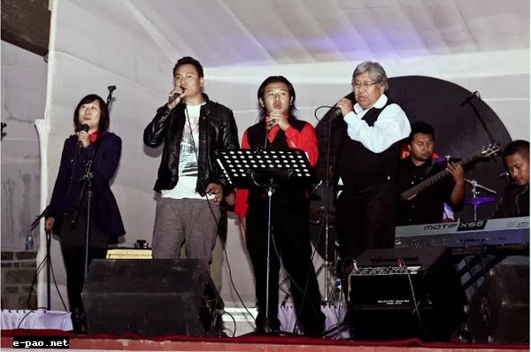 Chief Guest of The Beatles Mania Show, Dr Nicky Kire (right), Parliamentary Secretary, Law and Justice, Land Revenue, Labor and Employment, singing together with the 3 bands on the stage amidst cheers from the capacity crowd on Saturday night at The Heritage, Kohima