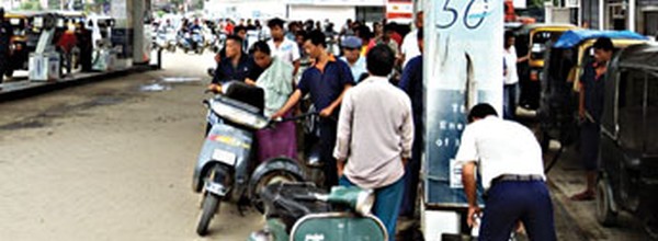 A file pic of a long queue outside a petrol pump during one of the lean periods