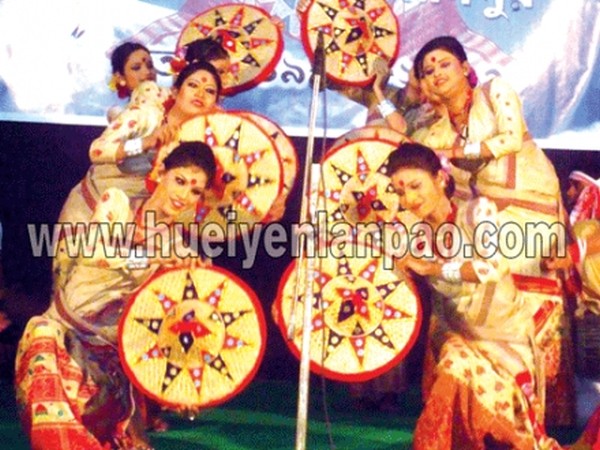 Bihu dance being presented on the occasion of Rongali Bihu Festival celebration at Kalibari, Thangal Bazar