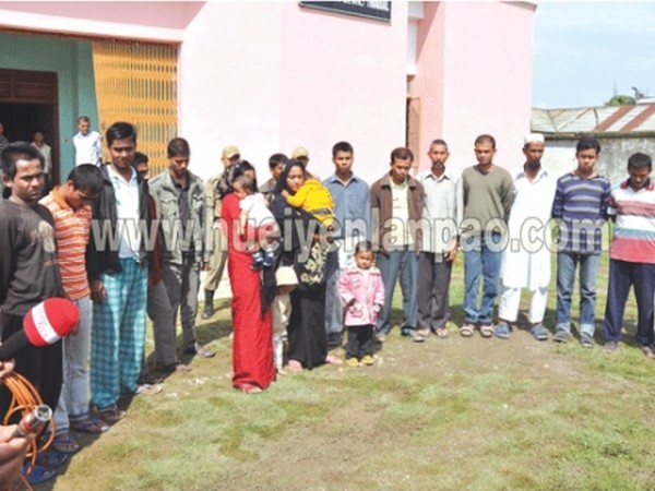 A group of illegal migrant workers and their families who were pulled up in the State