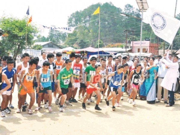 Minister Md Abdul Nasir flagging off the cross country race to kick off the 5-day long 1st Kakching Festival
