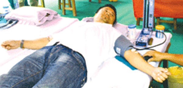 A donor donating blood on the occassion of World Blood Donor Day