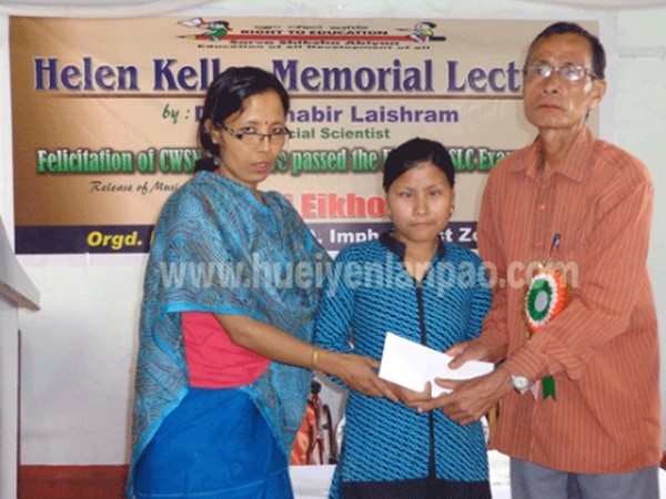 A differently abled student being felicitated on the occasion 