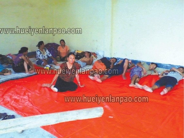 Evicted residents of Kabo Leikai taking shelter in a room of MBC Old Cemetery at Imphal