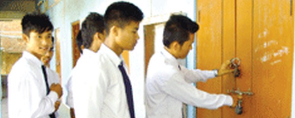 Students locking offices at the school