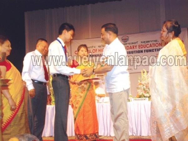 One of the toppers being felicitated during the function