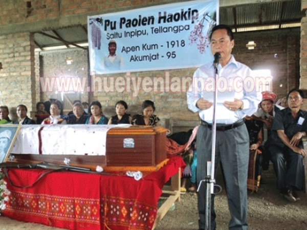 Minister Ngamthang Haokip reading out a condolence message during the funeral service of ex-MLA Paolen Haokip