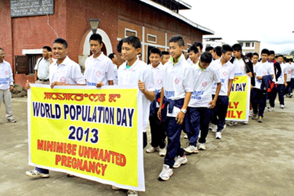 Young boys taking out a mass rally at Imphal in commemoration of World Population Day