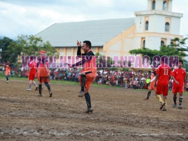 Manipuri film actor Kaiku dancing after scoring a goal in the Exhibition Football Match 