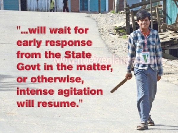 A TFO volunteer imposing curfew at Ukhrul town