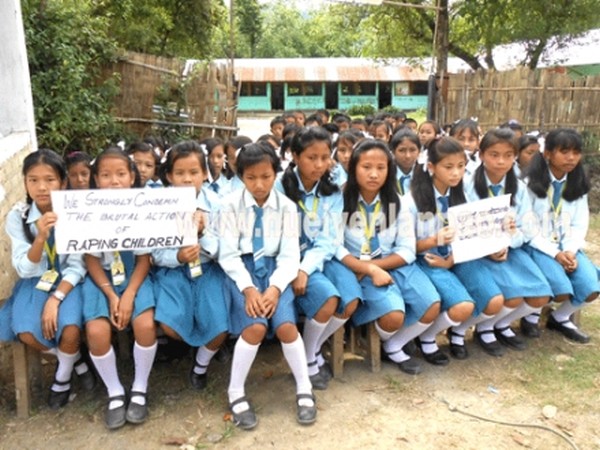 Students of a school in Patsoi area protesting against rising cases of rape of children in the State