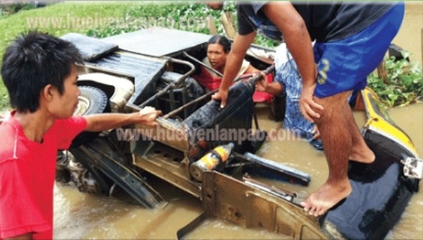 An passenger service autorickshaw fell into the road side ditch of the flooded road leading to Shija Hospital on Thursday