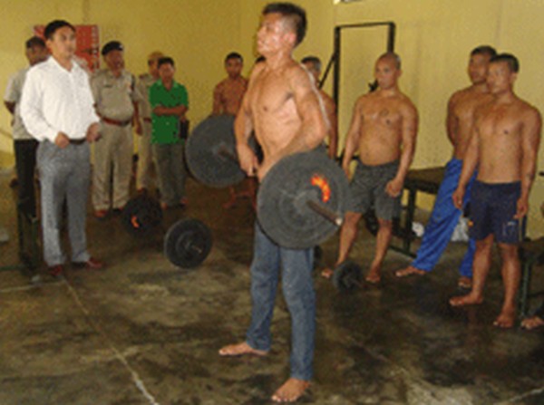 Inmates train in the gymnasium