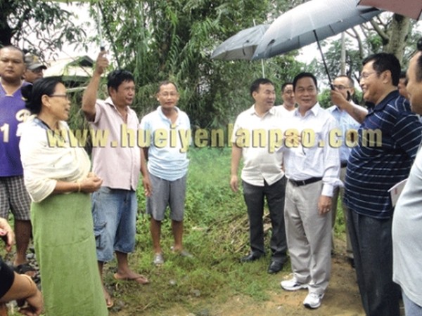 IFC Minister Ngamthang Haokip and other officials inspecting flood areas of Lamphelpat on Tuesday