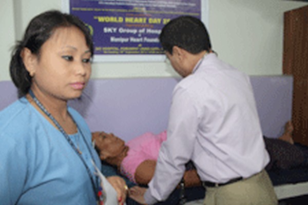 A doctor examining a patient on World Heart Day