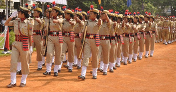 A women police march past contingent during the Police Raising Day celebration parade