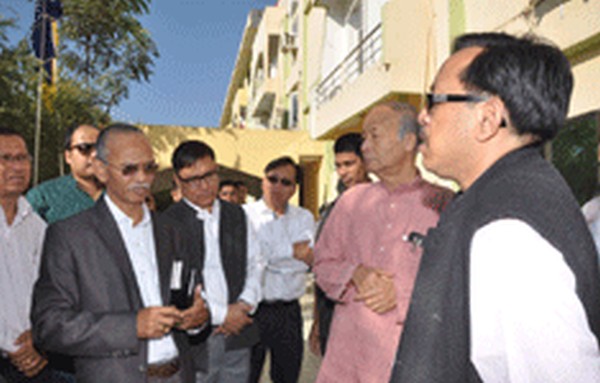 Officials briefing the CM on Hotel Imphal renovation works