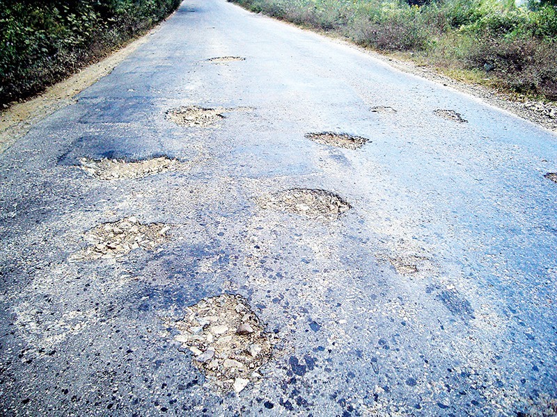 This picture looks like craters on Mars, but in actual it is the condition of National Highway No.2
