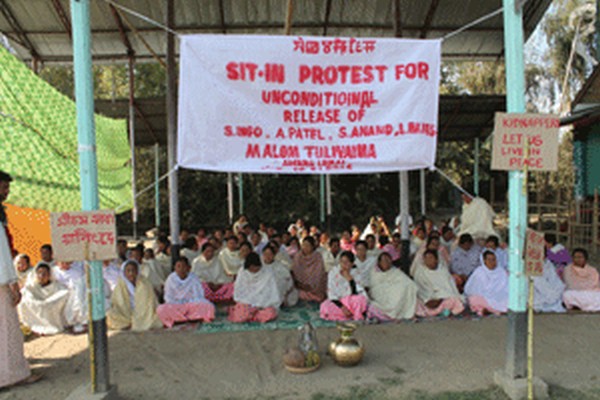 A sit-in protest staged at Malom demanding the release of labourers abducted by an UG group