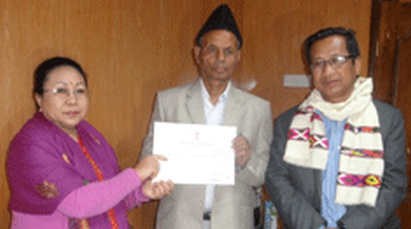 Abdul Salam being presented certificate of victory