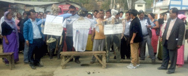 Committee volunteers enforcing road blockade in a Chandel district area