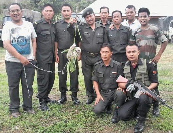 Personnel of 4th IRB posing with the rescued Bengal Slow Loris before handing over to People for Animal, Thoubal