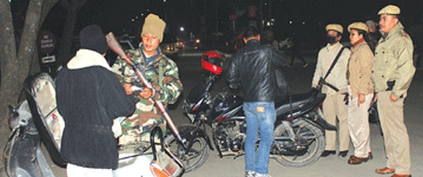 File pic of Manipur police on frisking duty at Imphal