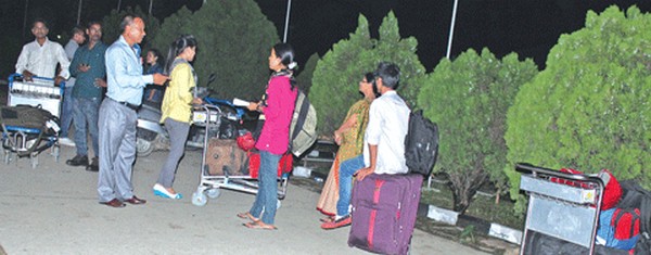 Stranded passengers at Tulihal airport after the AI flight bound for Imphal was cancelled