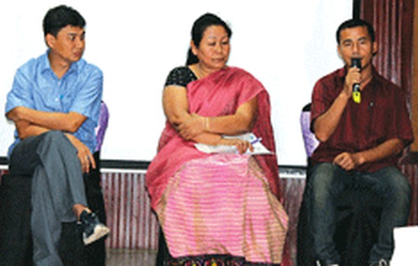 Babloo Loitongbam , Sobita Mangshatabam and Thangjam Dolendro  at the de-briefing event at Imphal on July 6 2014