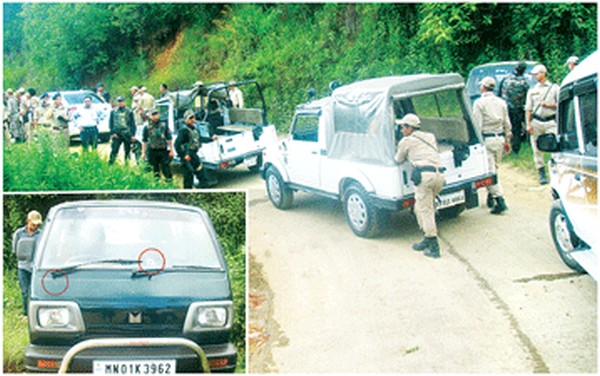 Security personnel inspecting the ambush site and the van which bore the brunt of the attack (Inset)