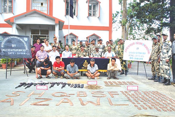   BSF team with the apprehended arms and persons