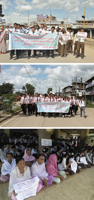 School students and women activists staging a sit-in-protest as another group of students took out a protest rally on the common demand for enforcement of ILPS in Manipur