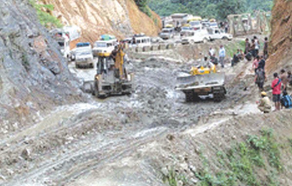 A truck wades through Imphal-Jiribam road