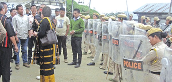 Police personnel with protestors at Ukhrul