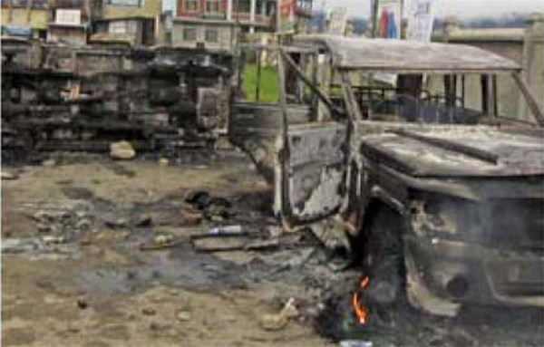 Charred remains of a Gypsy and Bolero jeep after they were set ablaze at Ukhrul town