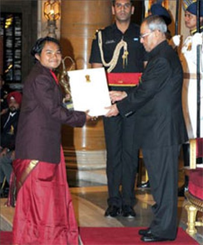 The President, Shri Pranab Mukherjee presenting the Arjuna Award for the year-2014 to Yumanam Renubala Chanu for Weightlifting