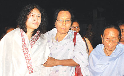 Sharmila being escorted by women activists after her release from JNIMS security ward 