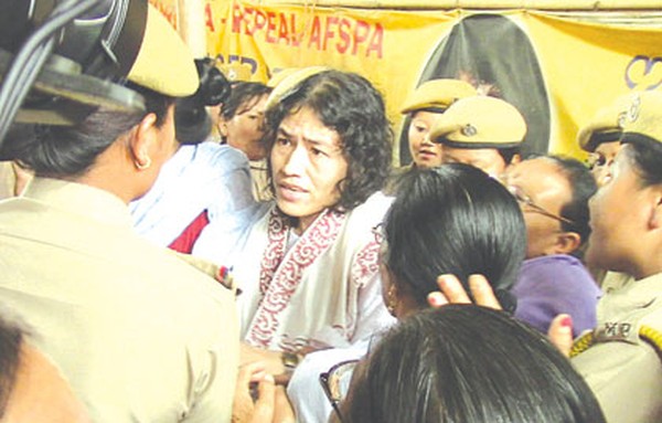 Sharmila being pulled away by police